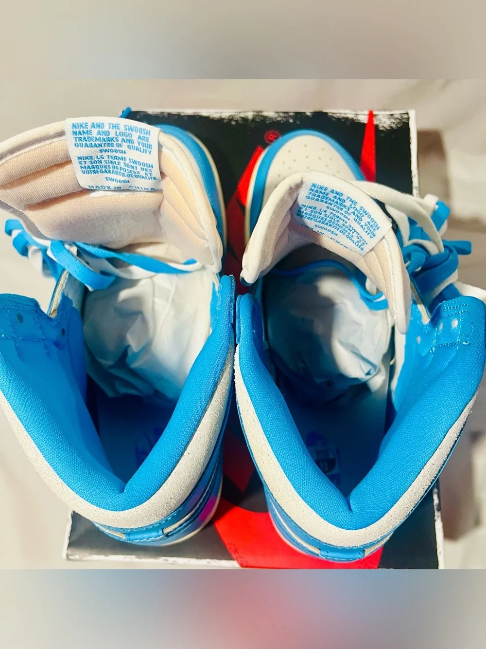Nike Jordan Retro High-Top Sneakers in Baby Blue and White with Cream Midsole